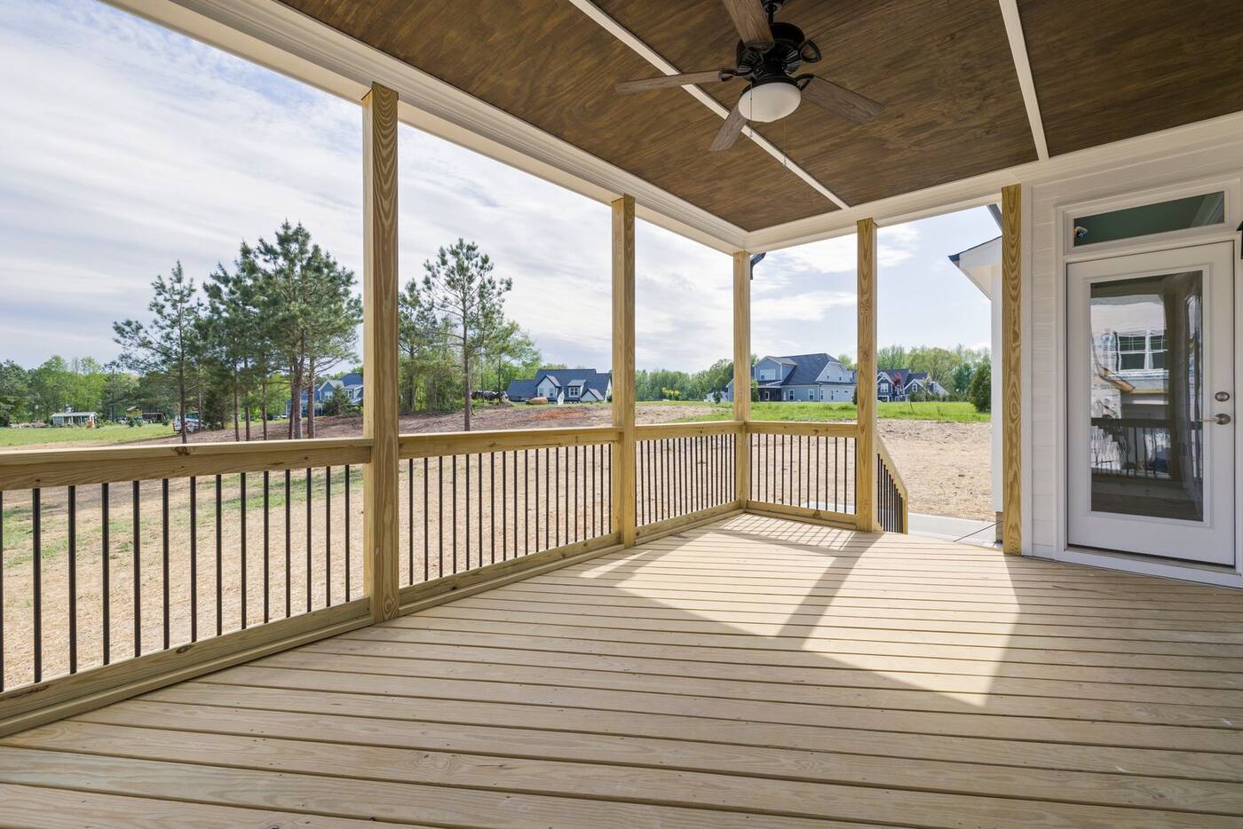 After: the finished two-level cedar deck