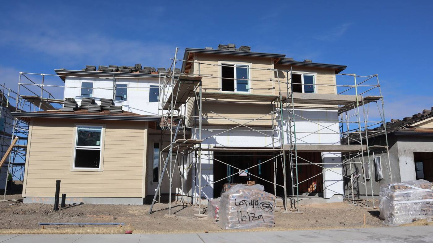 After: the new siding, roof and gutters